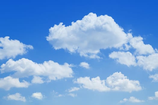 Blue sky with white clouds in daytime.