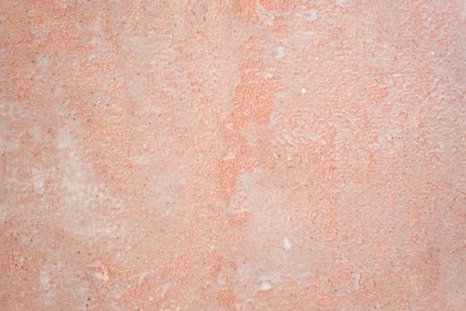 Rough textured wall in bright orange tone. Concept of template