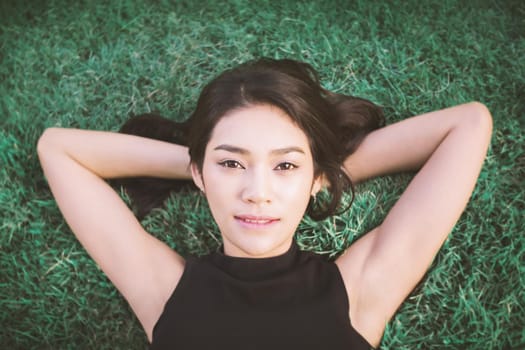 Outdoor portrait of a beautiful asian girl vintage tone.