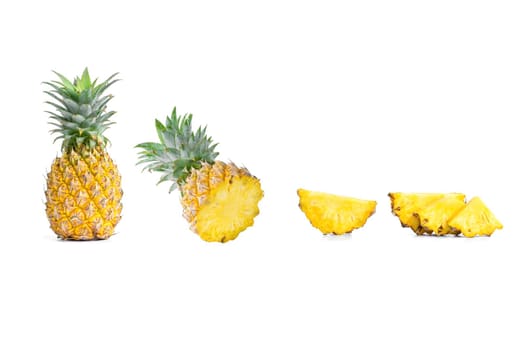 Collection of sliced pineapples and pineapple isolated on white background