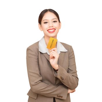 Smiling business woman show credit card.Isolated on white background