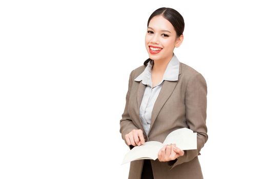 Business woman reading a book, isolated on white background.