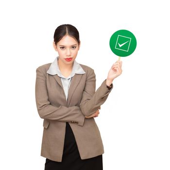 business woman is holding a checkbox, a concept of decision making process.