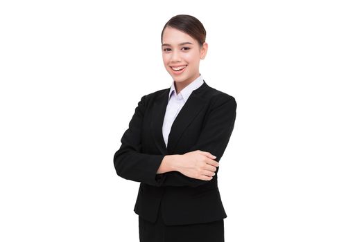 Smiling business woman with folded hands against white background.