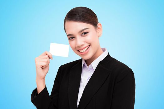 Smiling business woman show credit card.