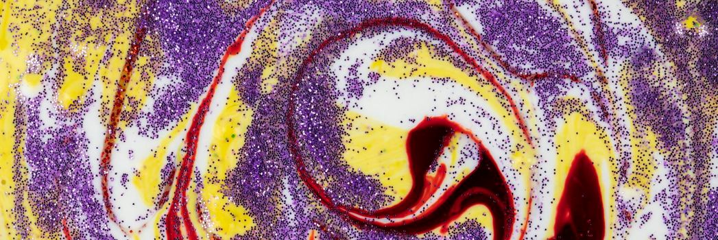 Yellow smeared in a circle with purple sparkles Abstract pattern with curls. Popular fashionable art design.