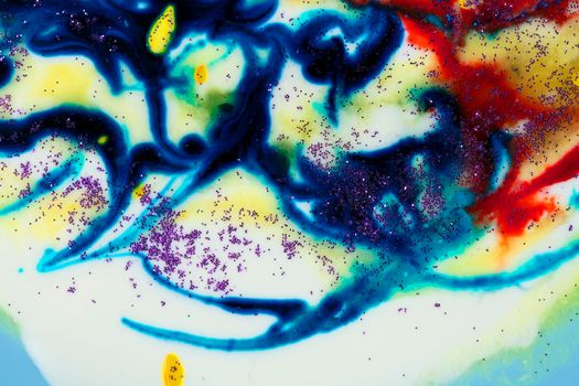 Very beautiful transparent art. An abstract work of art. Ink colors are amazingly bright, luminous, translucent, smooth. Blue and red streaks on a white background.
