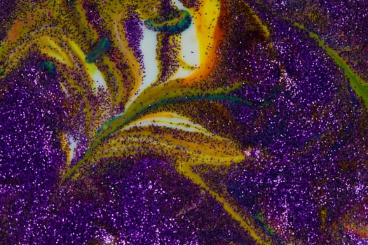 Multicolored acrylic backdrop sprinkled with purple sparkles. Contemporary creativity. Colorful avant-garde rich texture. A background made up of many shapes and materials.