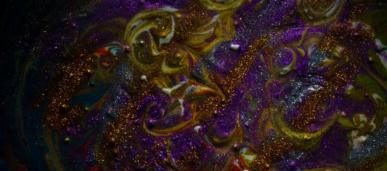 Multi-colored dark background sprinkled with purple and gold sparkles. Contemporary creativity. A colorful avant-garde painting with rich texture. A background made up of many shapes and materials.