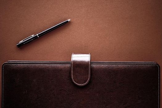 Productivity, work and corporate lifestyle concept - Vintage business briefcase on the office table desk, flatlay background