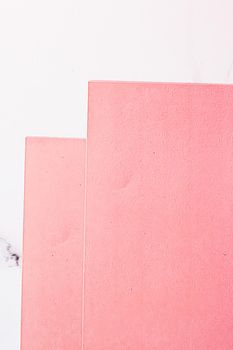 Pink A4 papers on white marble background as office stationery flatlay, luxury branding flat lay and brand identity design for mockups