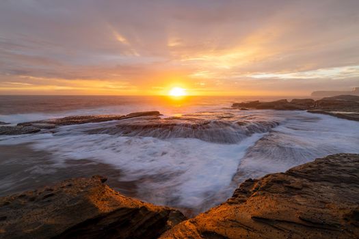 Beautiful sunrise over the ocean at South Coogee Australia