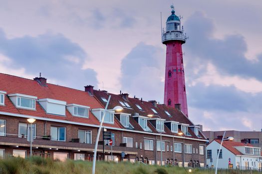 Scheveningen Lighthouse at sunset. Scheveningen, South Holland, Netherlands.