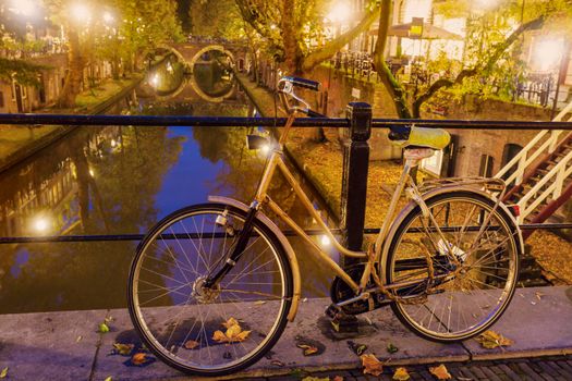 Old bike on the bridge in Utrecht. Utrecht, South Holland, Netherlands.