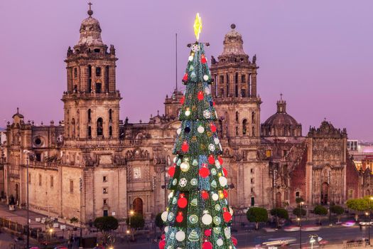 Christmas in Mexico City - Metropolitan Cathedral and Christmas tree on Zocalo square. Mexico City, Mexico.