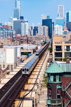  L train going towards downtown of Chicago. Chicago, Illinois, USA.