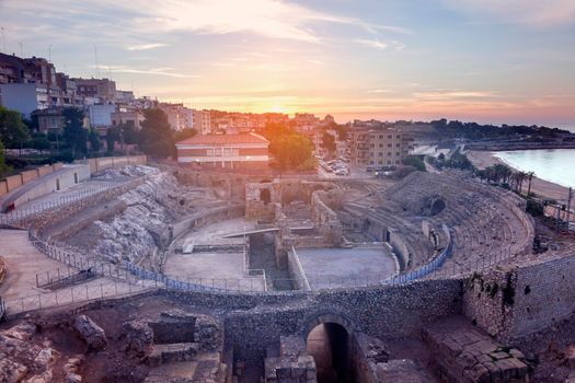 Roman Amphitheatre in Tarragona seen at sunrse. Tarragona, Catalonia, Spain.