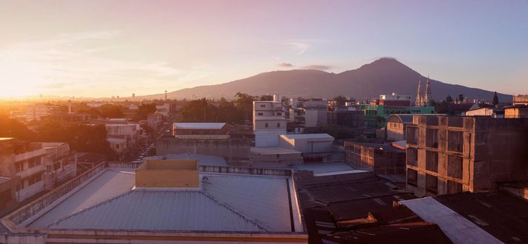 Basilica of the Sacred Heart and San Salvador panorama at sunset. San Salvador, El Salvador.