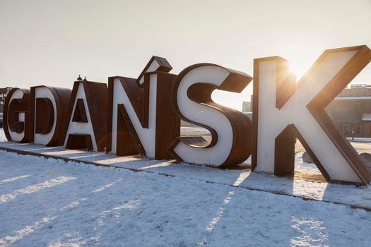Gdansk sign at sunrise. Gdansk, Pomerania, Poland.