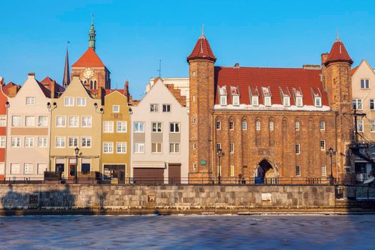 Old gate in Gdansk at sunrise. Gdansk, Pomerania, Poland.