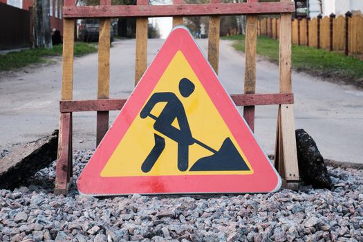 Road signs. Road works. Replacement of the road surface.