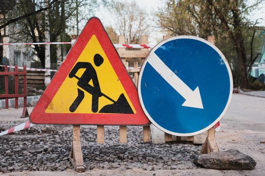 Road signs. Road works. Replacement of the road surface.