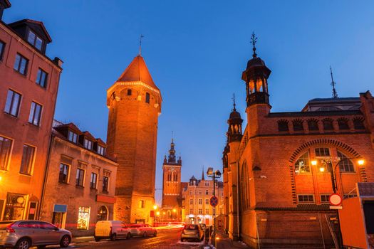 Market Hall, St Catherine Church and St Hyacinth Tower in Gdansk at night. Gdansk, Pomerania, Poland.