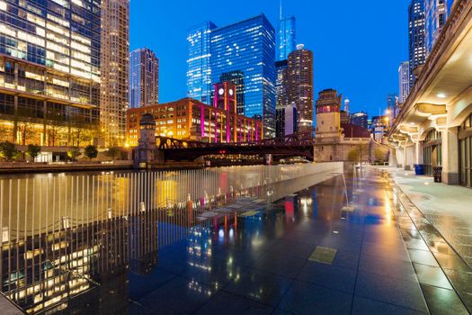 Colorful architecture of Chicago along Chicago River at night. Chicago, Illinois, USA.