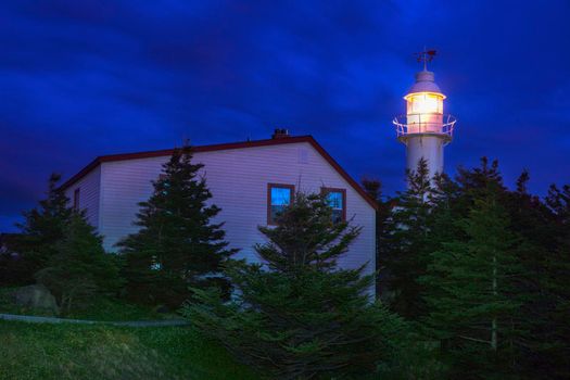 Lobster Cove Head Lighthouse at night. Newfoundland and Labrador, Canada.