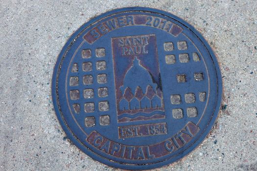 Manhole in St. Paul. St. Paul, Minnesota, USA.