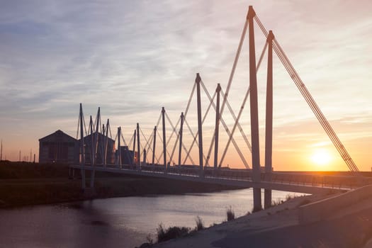 Pedestrian Bridge in Dunkirk at sunset. Dunkirk, Hauts-de-France, France.