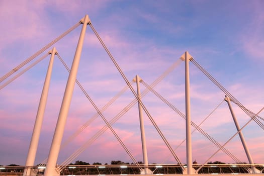 Pedestrian bridge in Dunkirk at sunset. Dunkirk, Hauts-de-France, France.