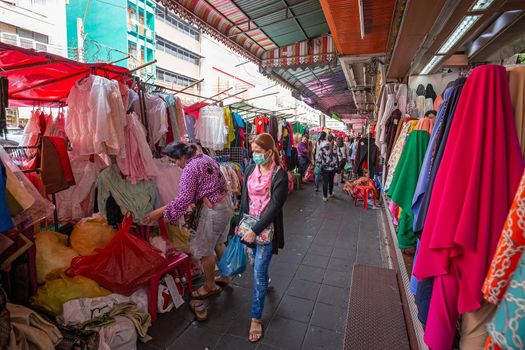 BANGKOK, THAILAND - 22 Dec 2018  : Unidentified people shop at a market in Little India. Little India is an ethnic neighborhood surrounding Phahurat Road