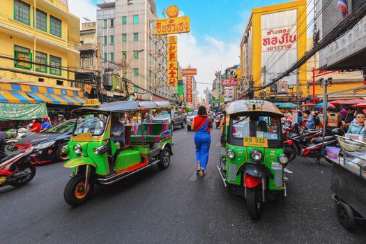 BANGKOK, THAILAND - 22 Dec 2018  :Tuk-Tuk is the name of Thai traditional taxi.Chinatown is famous landmark in Bangkok.