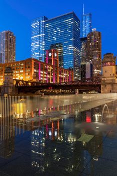 Colorful architecture of Chicago along Chicago River at night. Chicago, Illinois, USA.