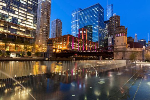 Colorful architecture of Chicago along Chicago River at night. Chicago, Illinois, USA.