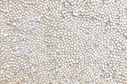 White wall surface Decorated with circular stones