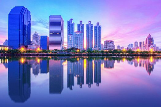 Bangkok city night light reflection on water