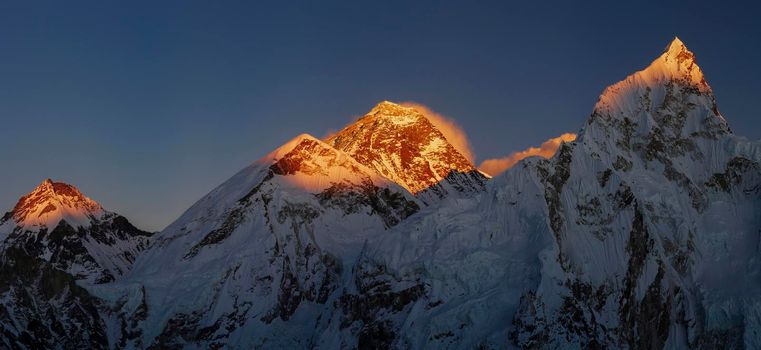 Everest and Nuptse summits at sunset or sunrise. Everest base camp trek, tourism in Nepal