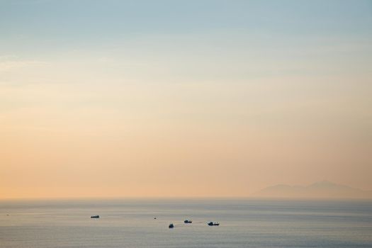 Morning sea fishing boat.Beautiful sunrise.High angle view
