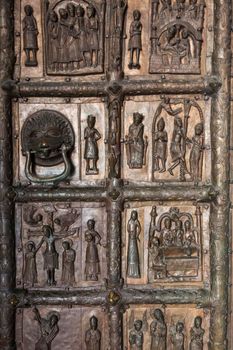 Door to Plock Cathedral. The door is a copy of originals from XII century. Plock, Masovia, Poland.