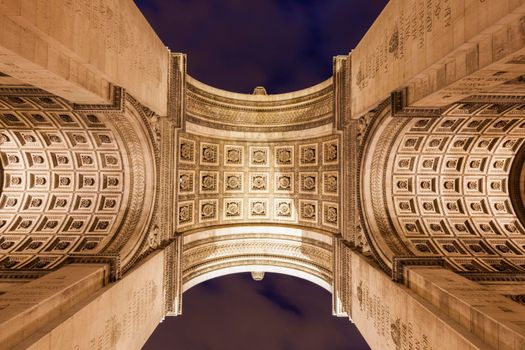 Arc de Triomphe in Paris seen at night. Paris, Ile-de-France, France.