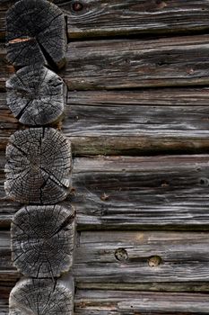 Wooden log cabin or felling  Rustic texture or background. Aged wood wall and boards