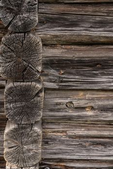 Wooden log cabin or felling  Rustic texture or background. Aged wood wall and boards