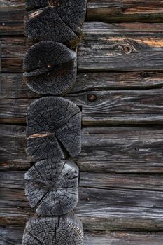 Wooden log cabin or felling  Rustic texture or background. Aged wood wall and boards