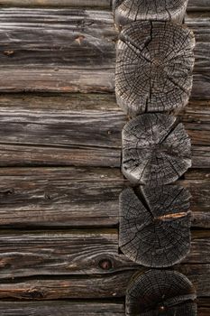 Wooden log cabin or felling  Rustic texture or background. Aged wood wall and boards