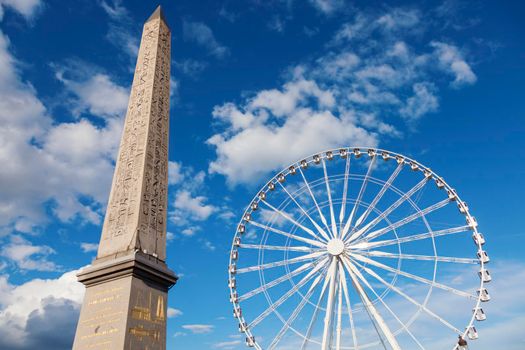 Luxor Obelisk and Ferris Wheel on Place de la Concorde in Paris. Paris, France