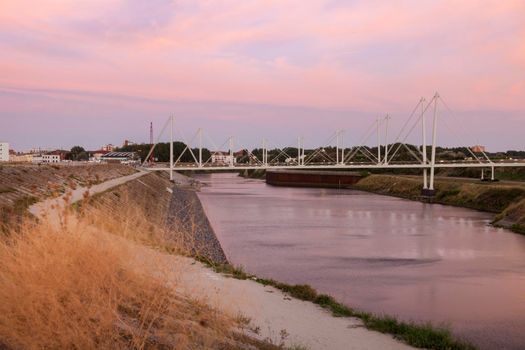Pedestrian bridge in Dunkirk at sunset. Dunkirk, Hauts-de-France, France.