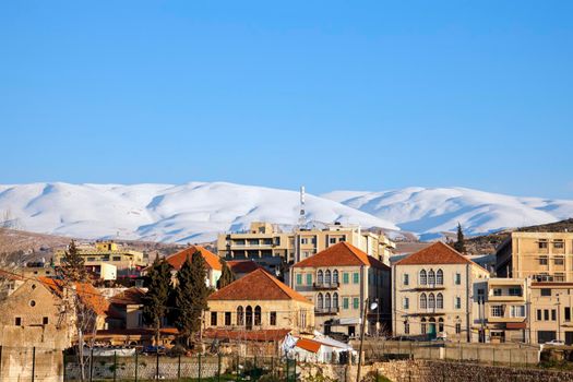Baalbek panorama with snowy mountains. Baalbek, Lebanon.