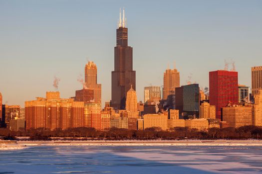 Winter in Chicago - skyline at sunrise. Chicago, Illinois, USA.